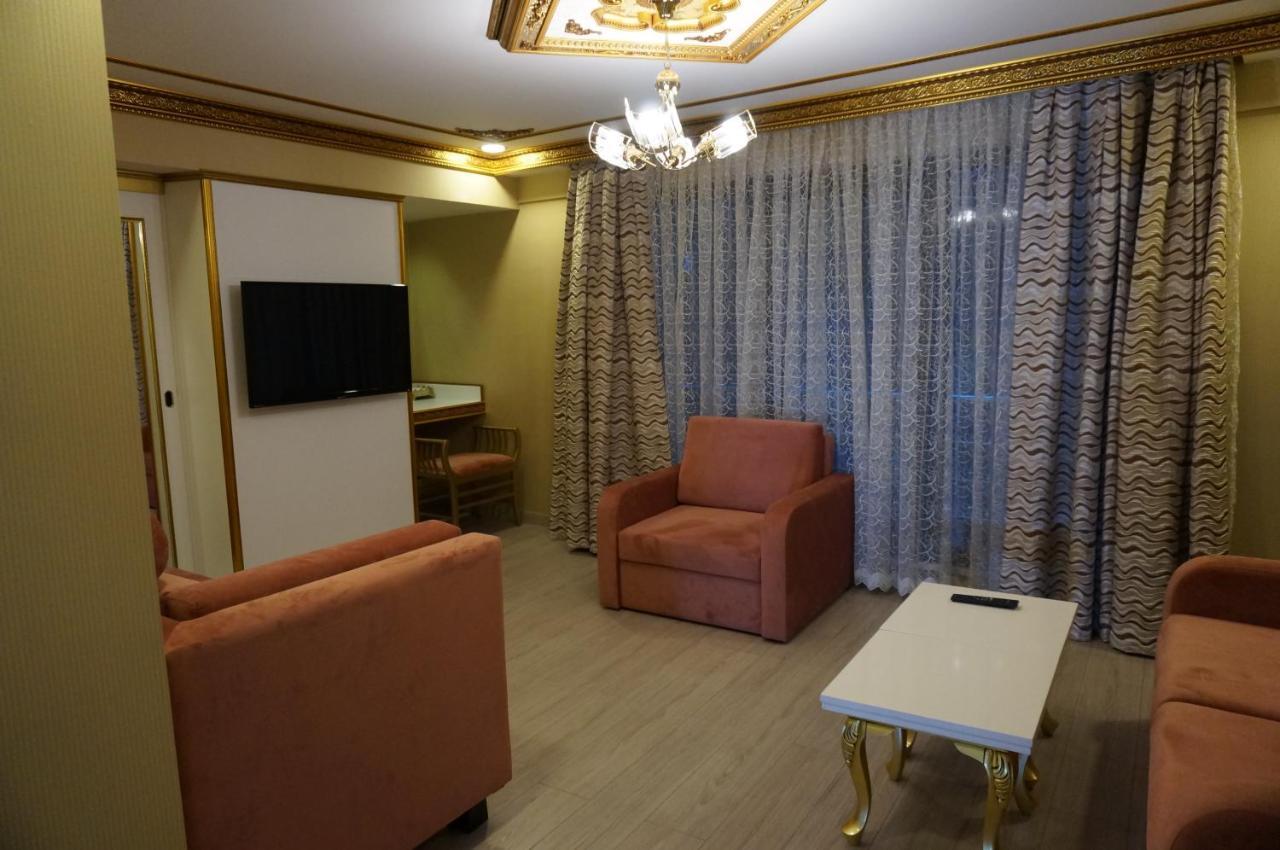 Phosphorion Hotel Istanbul Bagian luar foto A living room in a hotel