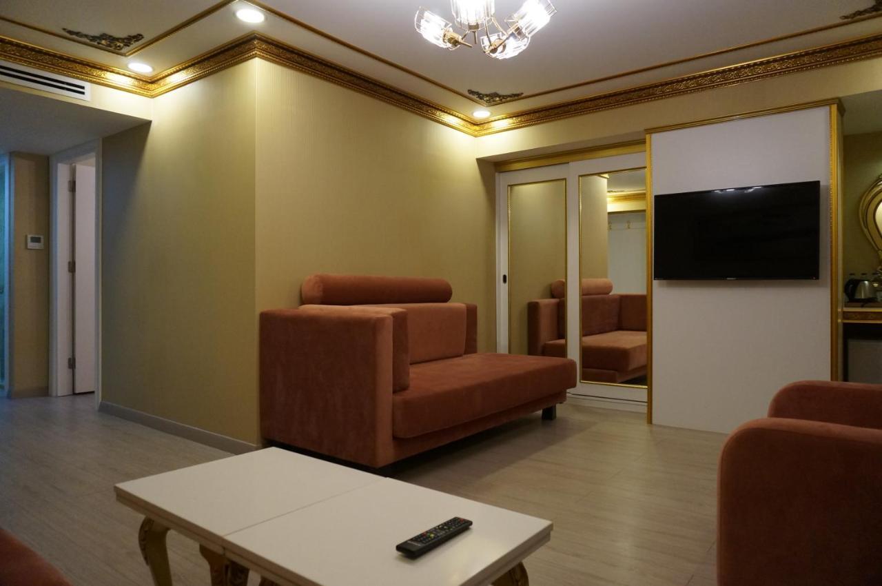 Phosphorion Hotel Istanbul Bagian luar foto A living room in a hotel