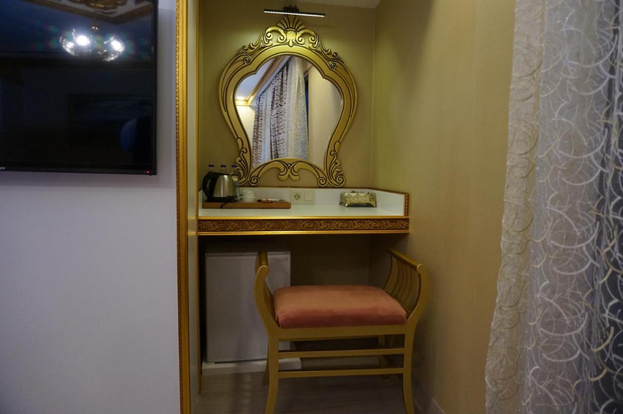 Phosphorion Hotel Istanbul Bagian luar foto A dressing table in a hotel room